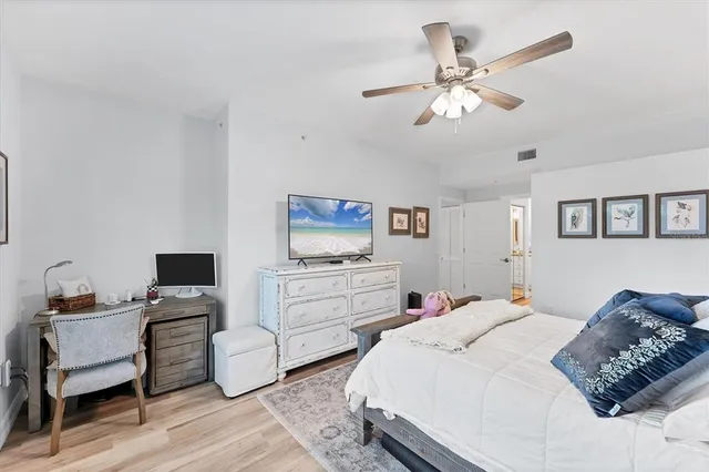 a bathroom with double sink and a mirror