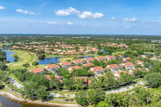 a view of a house with a swimming pool
