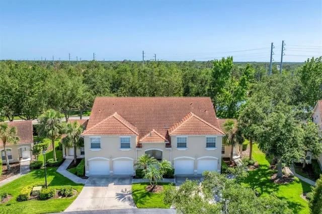 a front view of house with yard and outdoor seating