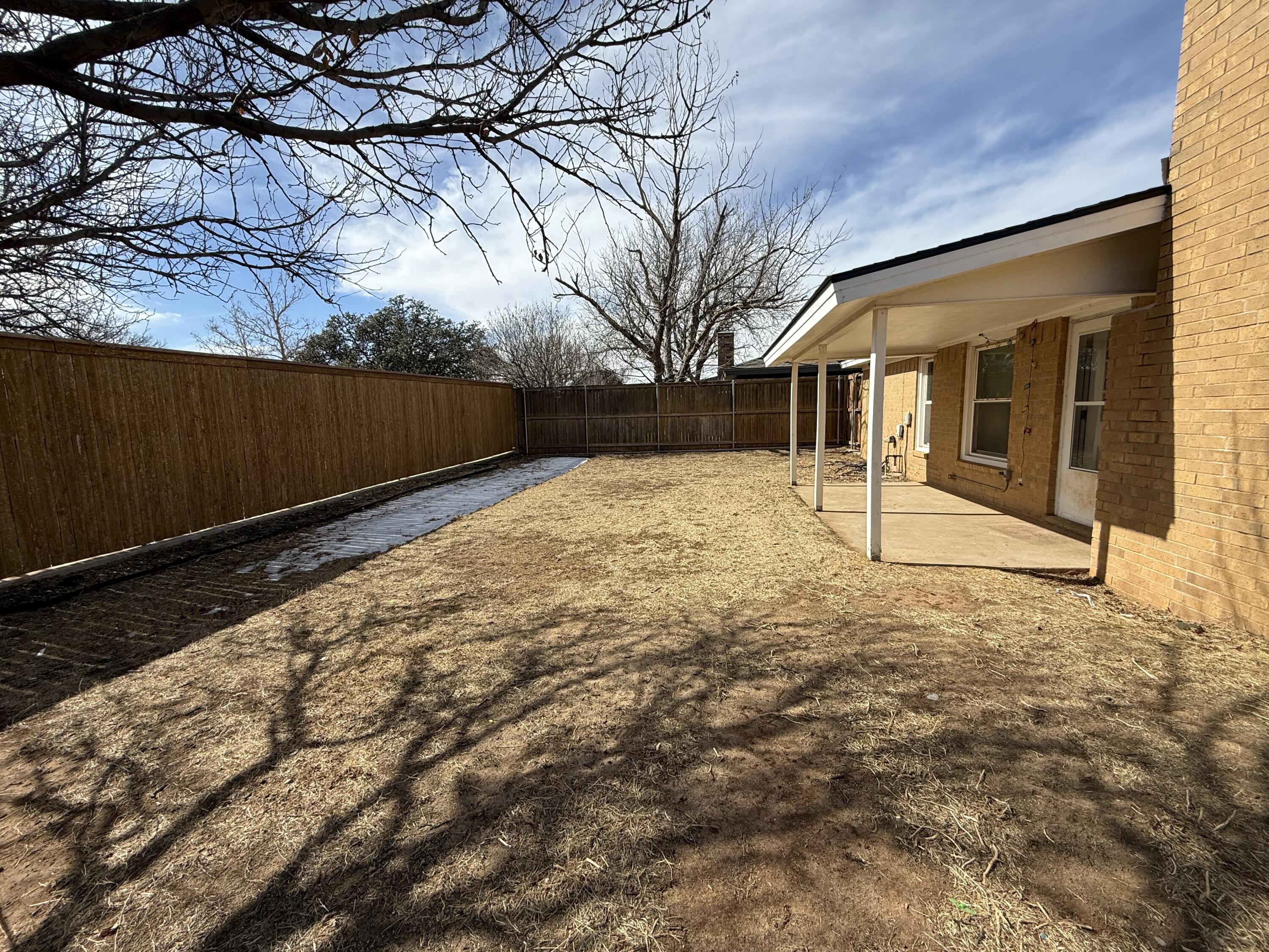 5729 89th Street Lubbock, TX 79424 - Photo 15 of 15 a view of backyard of the house