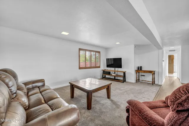 a room with furniture and a window