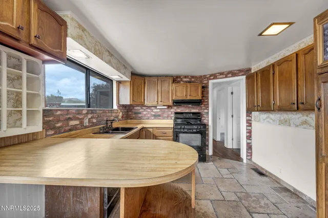 a bathroom with a double vanity sink mirror and bathtub