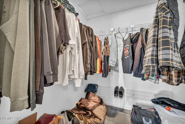 a view of a pathway with a wooden fence