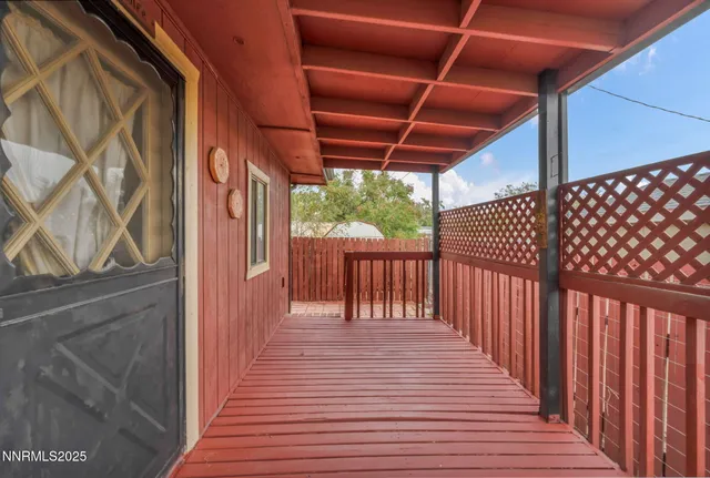 a view of a backyard with pathway