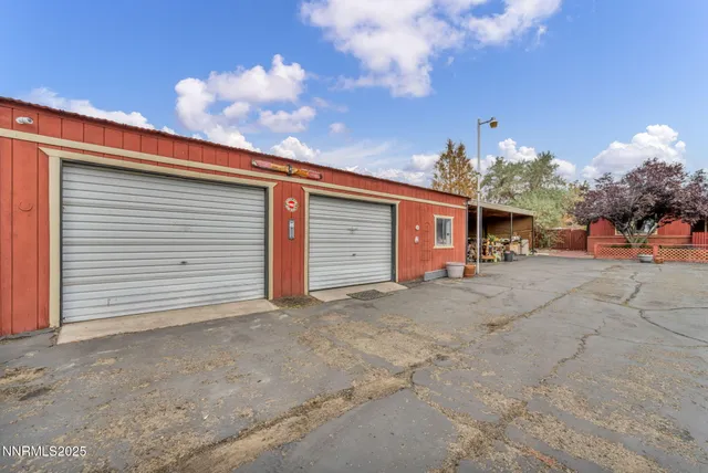 an aerial view of residential building and lake