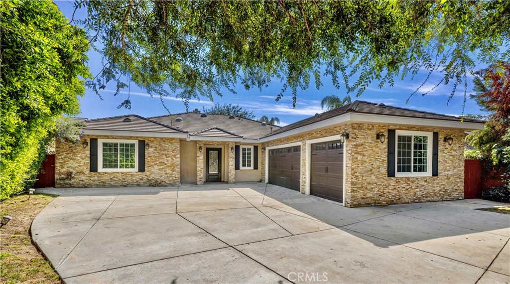 1125 De Anza Place Arcadia, CA 91007 - Photo 1 of 1 front view of a house with a garden