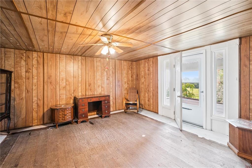 2789 Rutledge Road Transfer, PA 16154 - Photo 16 of 50 an empty room with furniture and a fireplace