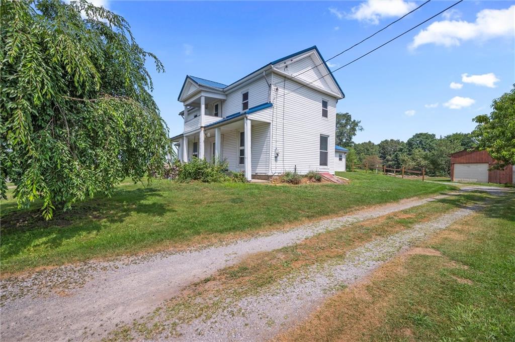 2789 Rutledge Road Transfer, PA 16154 - Photo 25 of 50 a front view of house with yard and green space