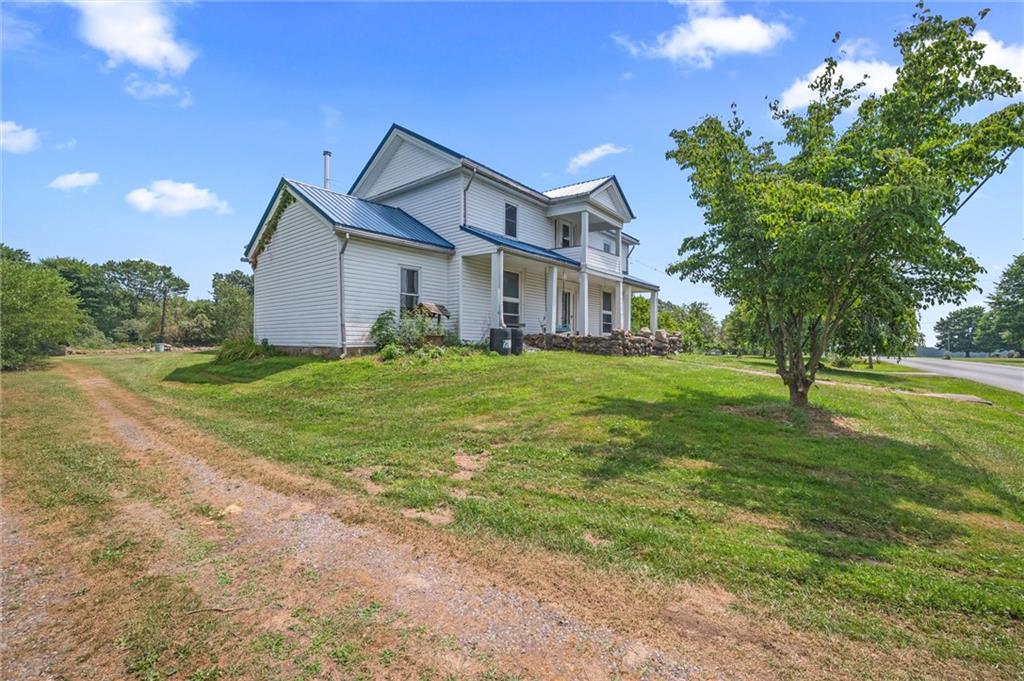 2789 Rutledge Road Transfer, PA 16154 - Photo 30 of 50 a big house with a big yard and large trees