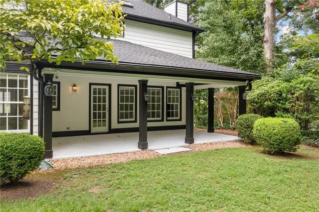 a house view with a garden space
