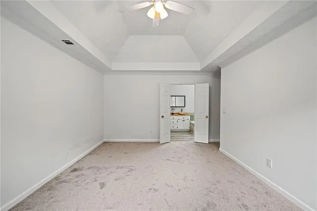 an empty room with a bathroom