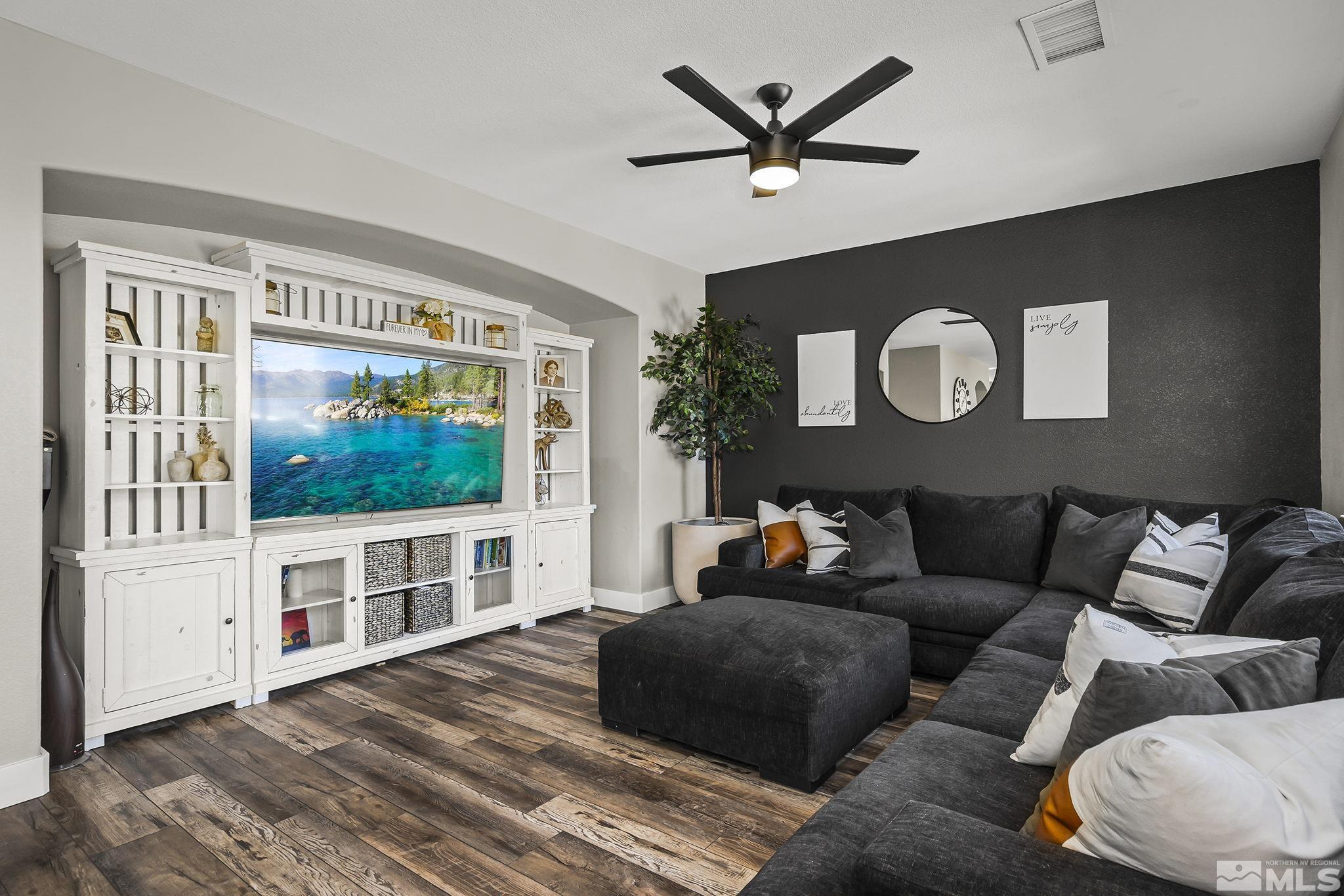 375 Sondrio Way Reno, NV 89521 - Photo 14 of 36 a living room with furniture and a flat screen tv