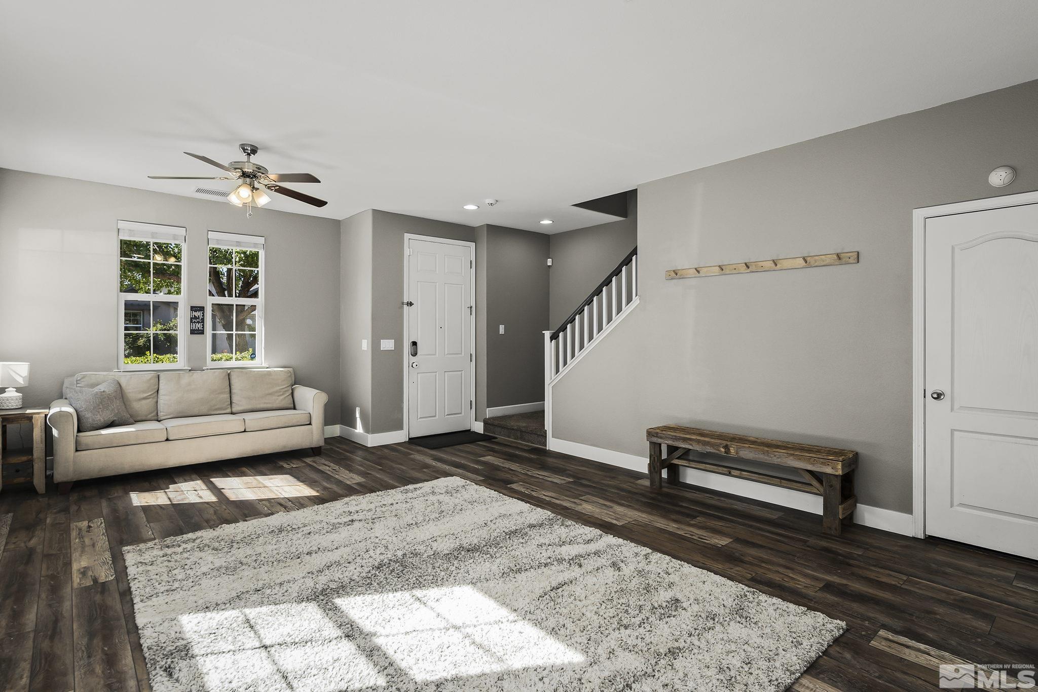 375 Sondrio Way Reno, NV 89521 - Photo 18 of 36 a living room with furniture and wooden floor