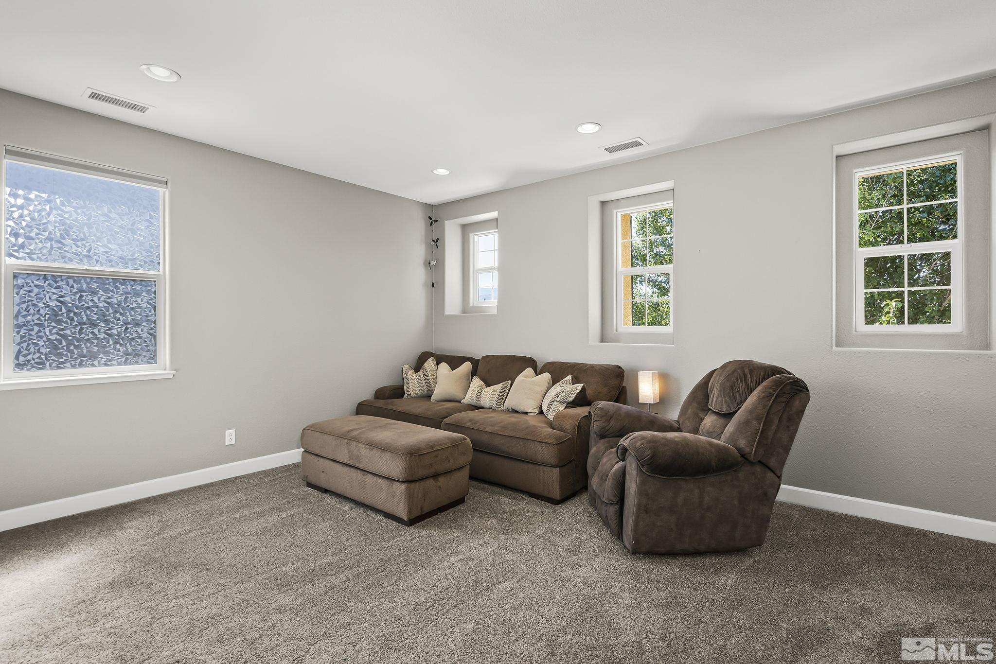 375 Sondrio Way Reno, NV 89521 - Photo 19 of 36 a living room with furniture and a window