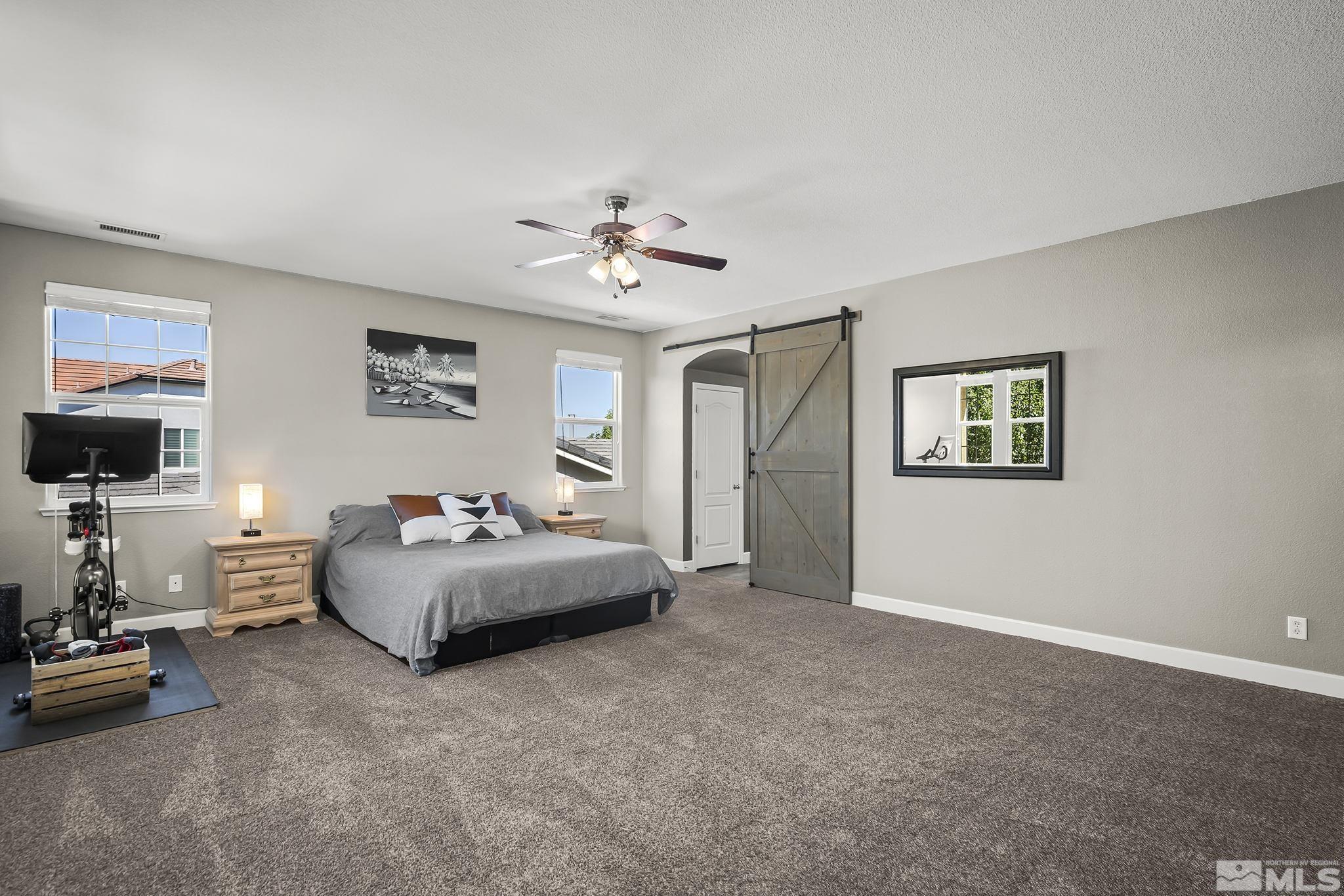 375 Sondrio Way Reno, NV 89521 - Photo 21 of 36 a living room with furniture and a flat screen tv