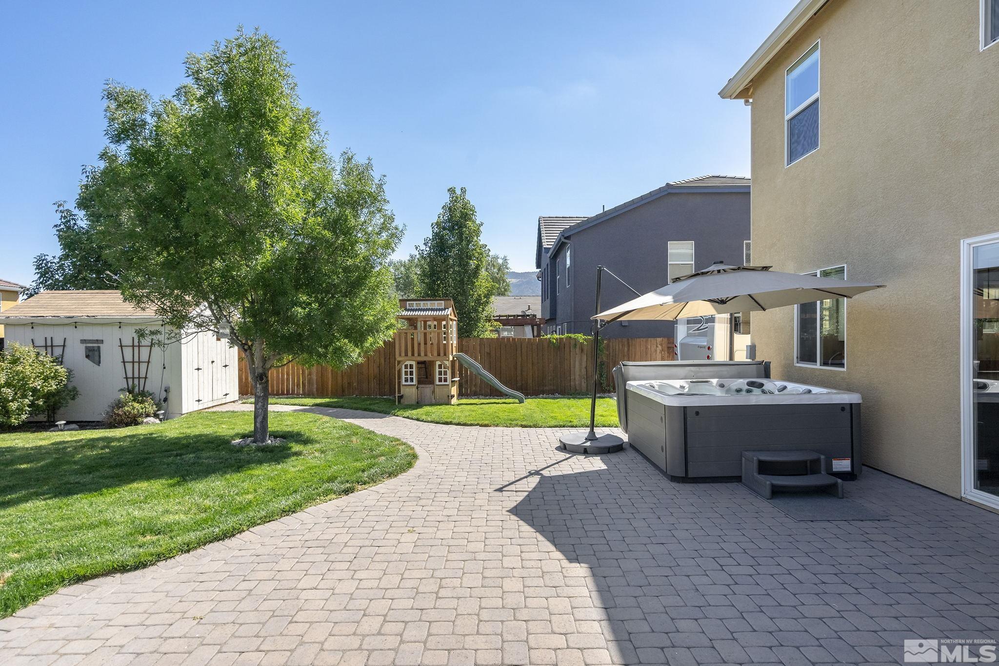 375 Sondrio Way Reno, NV 89521 - Photo 29 of 36 a view of a house with a yard and tree s