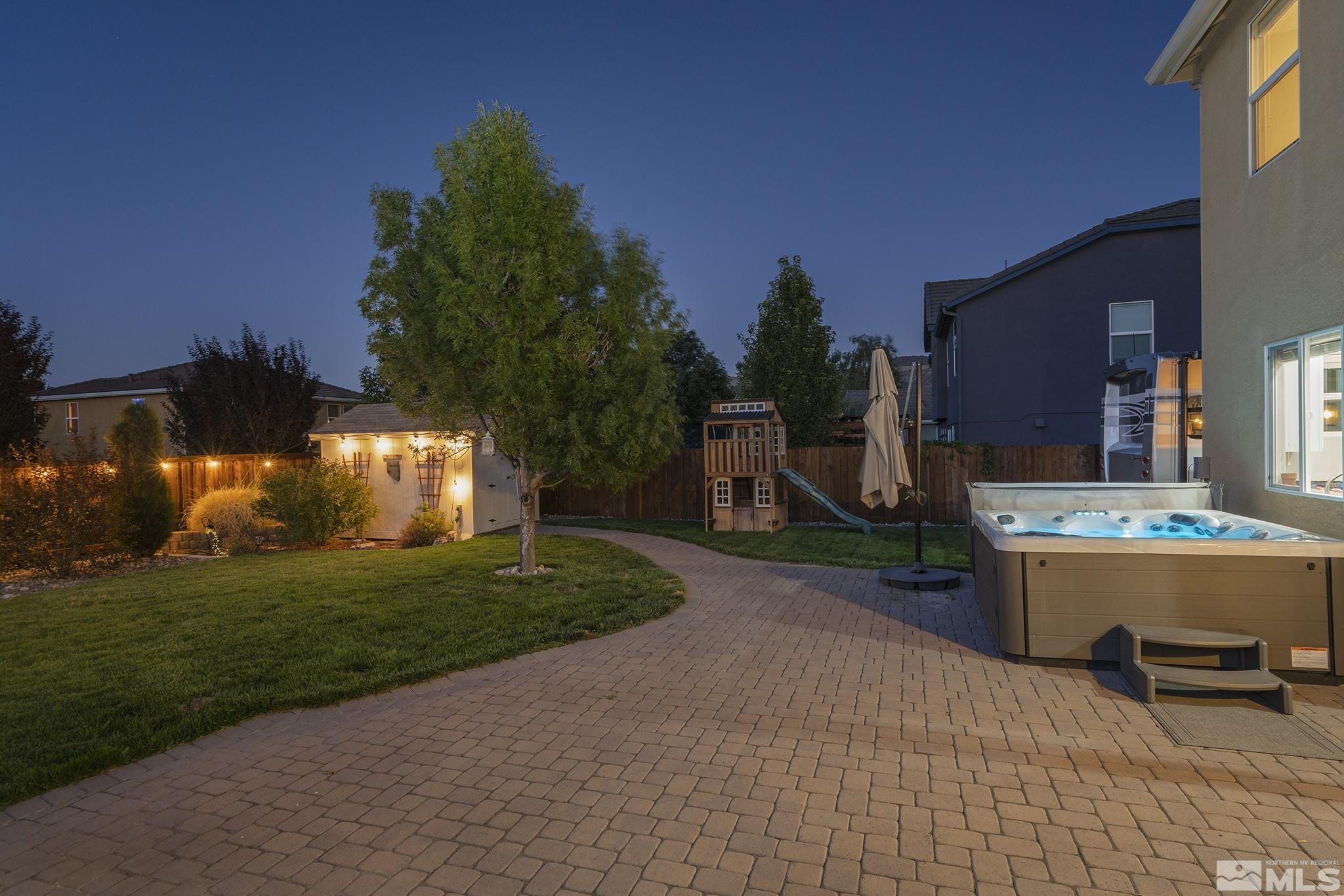 375 Sondrio Way Reno, NV 89521 - Photo 31 of 36 a view of a house with a backyard