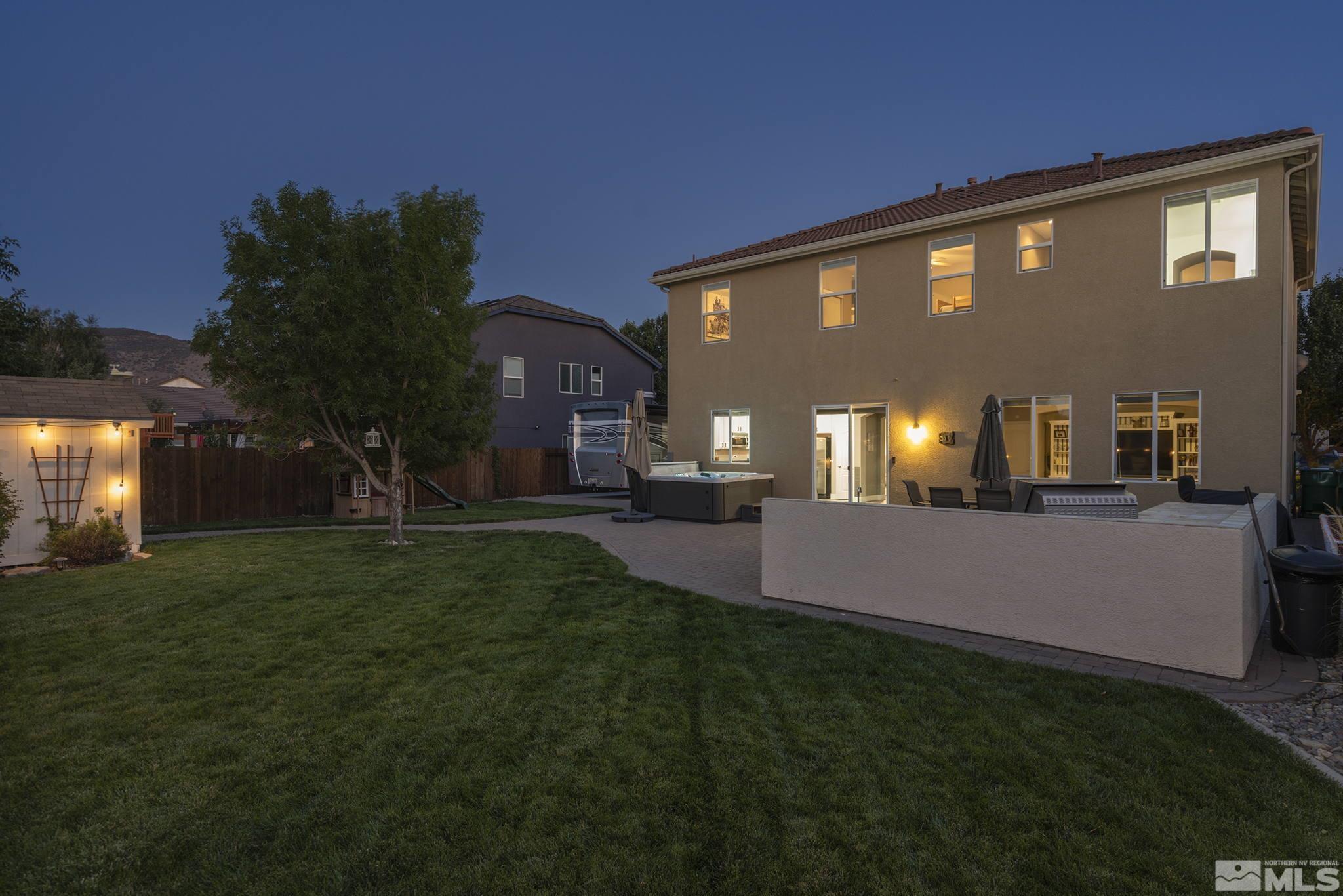 375 Sondrio Way Reno, NV 89521 - Photo 32 of 36 a front view of a house with a yard