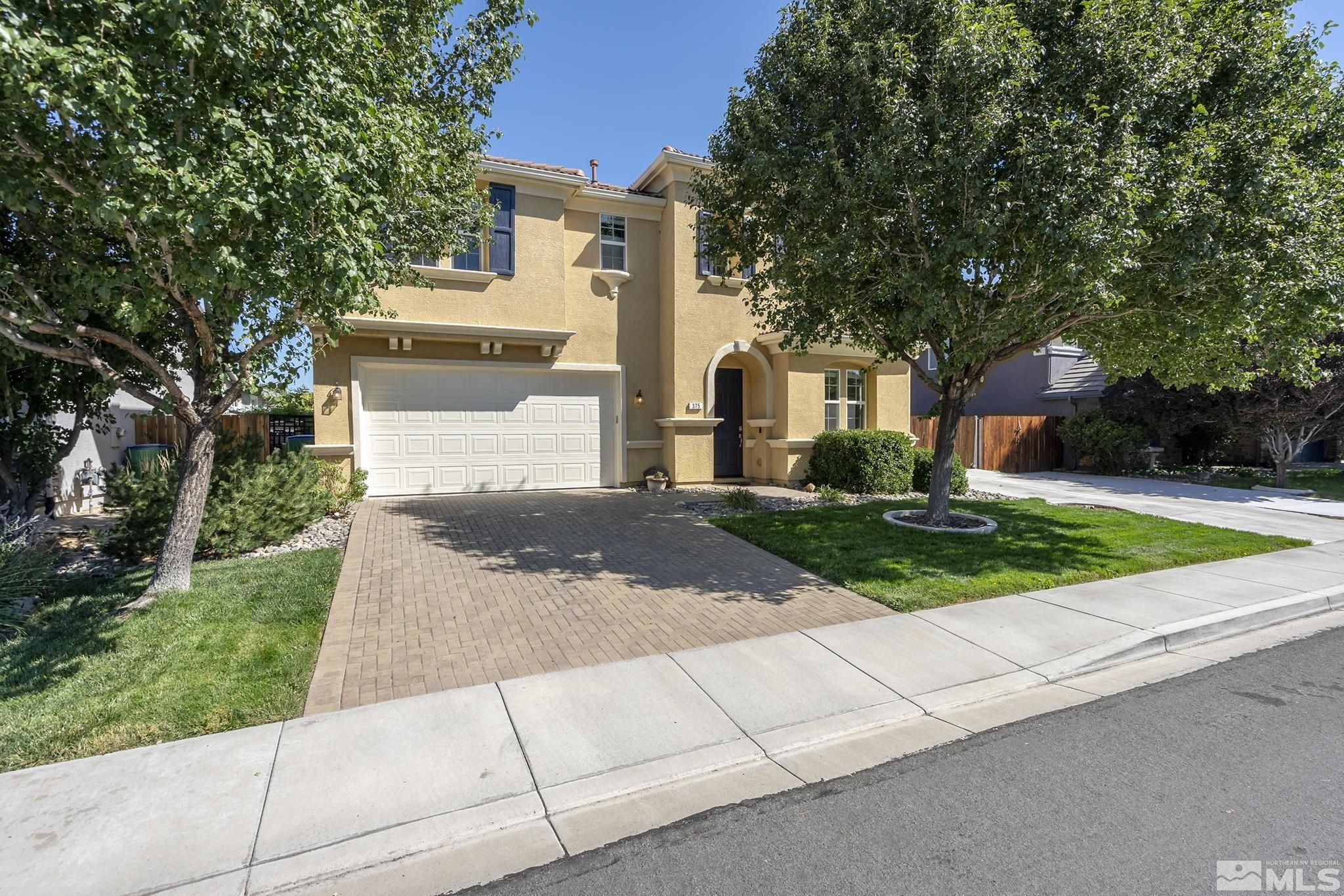 375 Sondrio Way Reno, NV 89521 - Photo 36 of 36 front view of a house with a yard