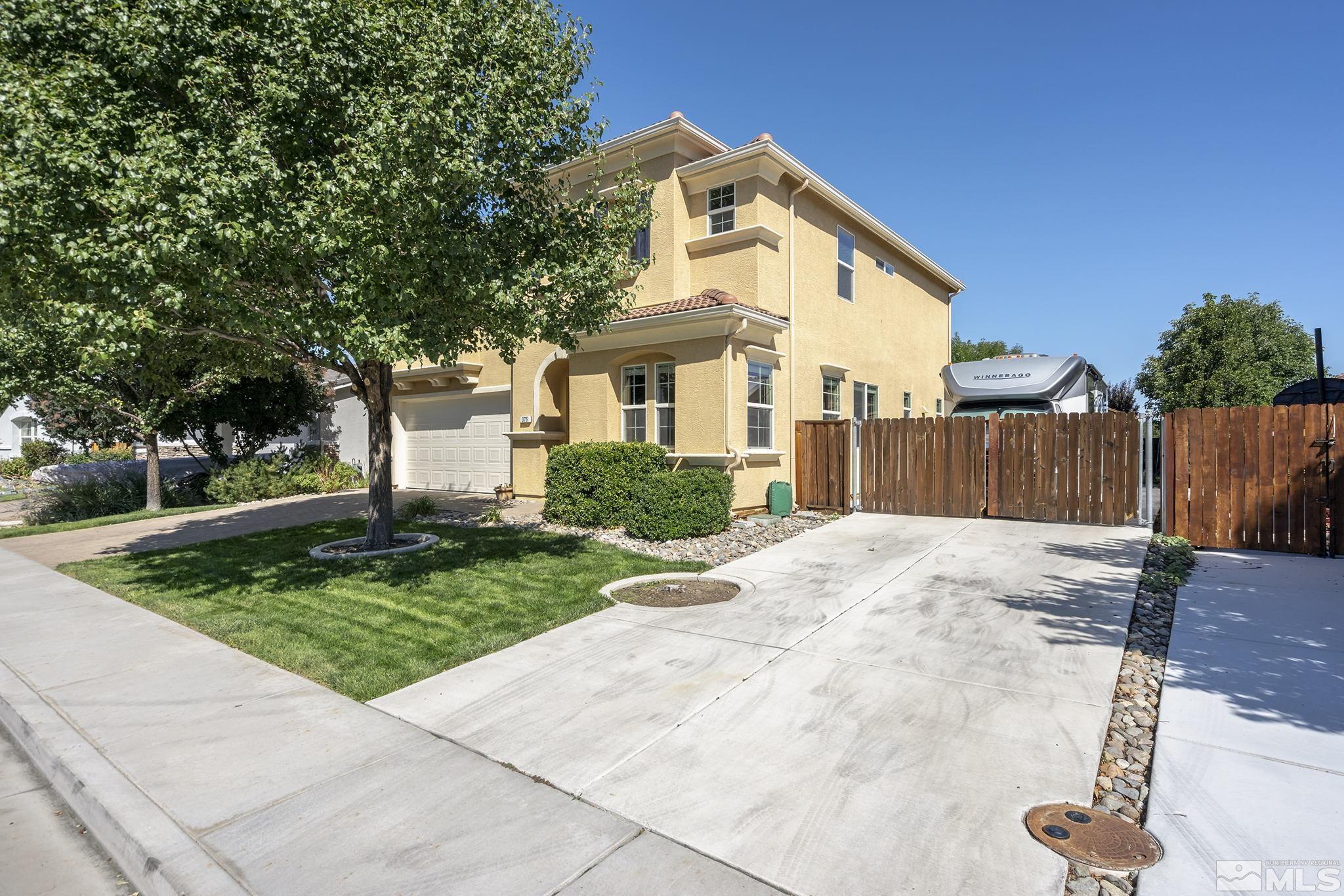 375 Sondrio Way Reno, NV 89521 - Photo 5 of 36 a view of a house with a yard