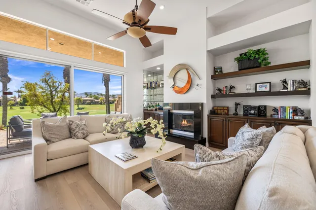 a dining room with furniture and window