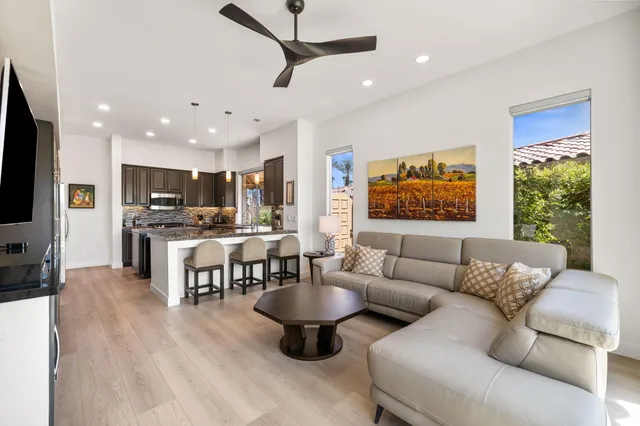 a kitchen with a sink and a large window