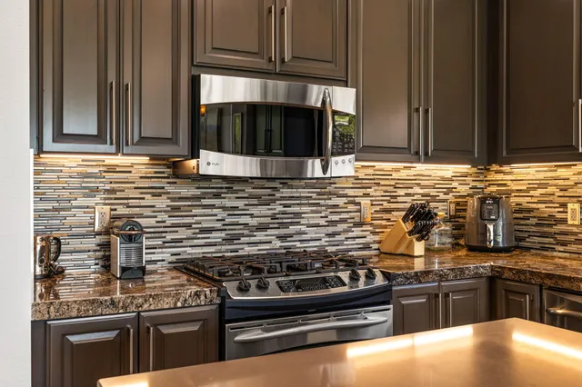 a bedroom with a bed chair and window