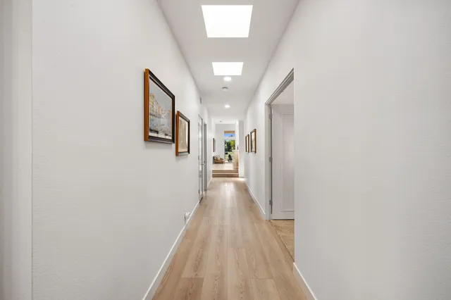 a bathroom with a toilet sink and shower