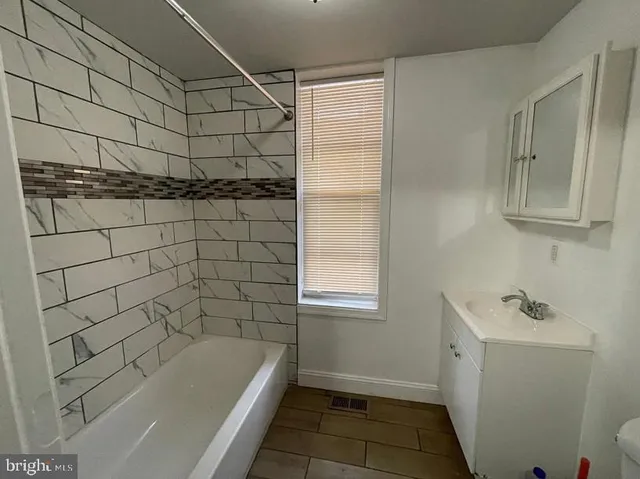 a bathroom with a bathtub