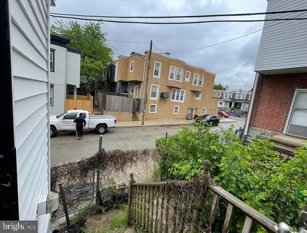 a view of a car park in front of a building