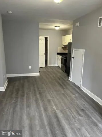 a view of a kitchen with a sink