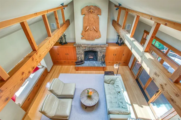 a spacious bedroom with a bed and a window