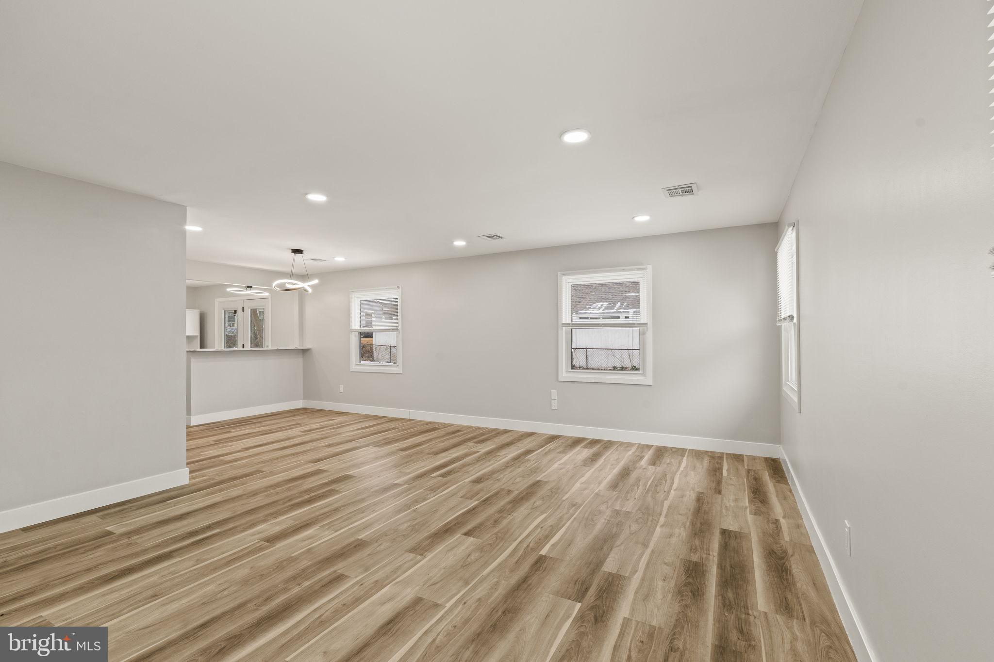 24 Pilgrim Lane Willingboro, NJ 08046 - Photo 9 of 40 a view of empty room with wooden floor
