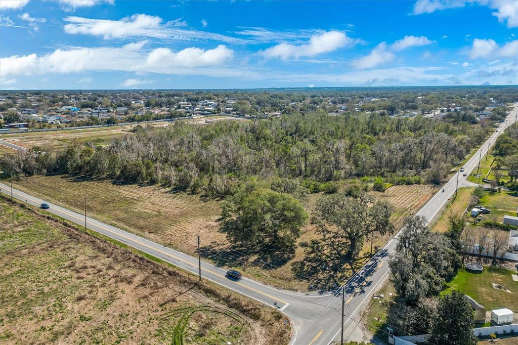 7835 Kathleen Road Lakeland, FL 33810 - Photo 8 of 10 a view of a city with lush green forest