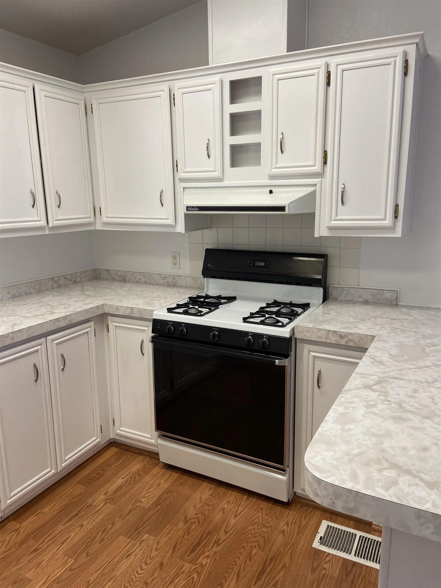 10000 Buena Vista Avenue, Unit 2 Santee, CA 92071 - Photo 2 of 12 a kitchen with granite countertop white cabinets and appliances