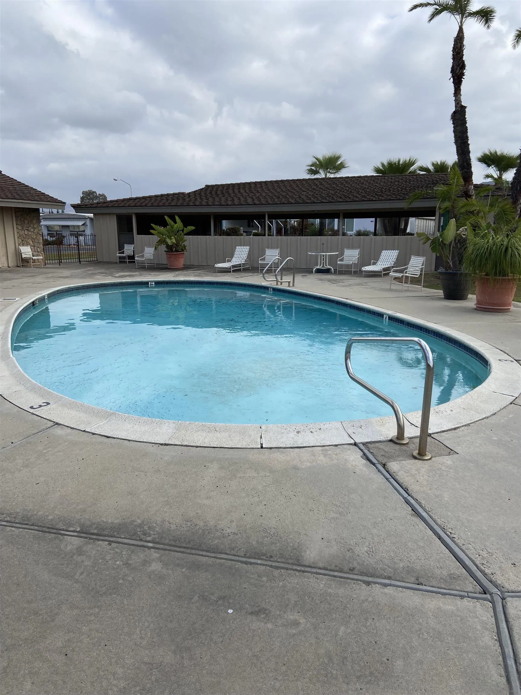 10000 Buena Vista Avenue, Unit 2 Santee, CA 92071 - Photo 9 of 12 a view of a swimming pool and an outdoor seating