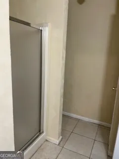 a view of room with racks and a window