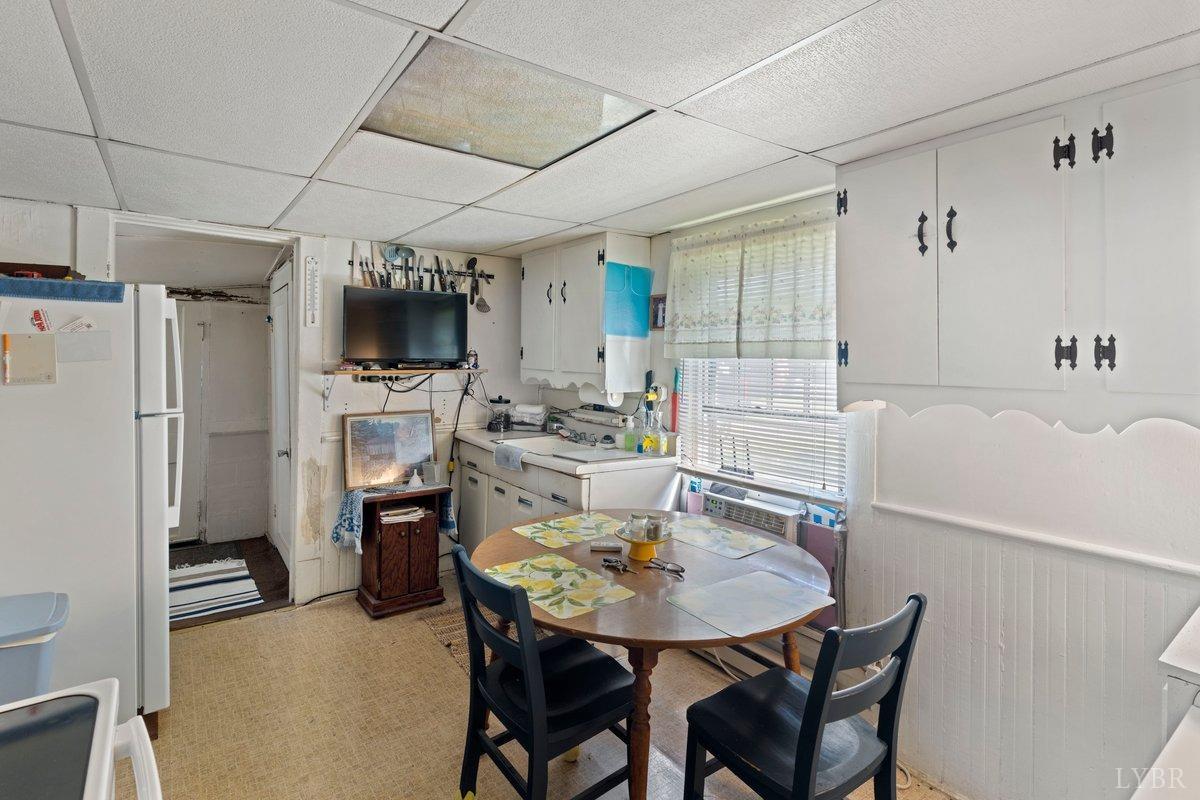 2608 Old Forest Road Lynchburg, VA 24501 - Photo 14 of 17 a view of a dining room with furniture