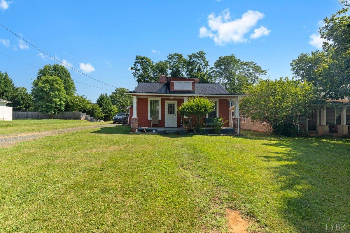 2608 Old Forest Road Lynchburg, VA 24501 - Photo 2 of 17 a front view of house with an outdoor space and seating