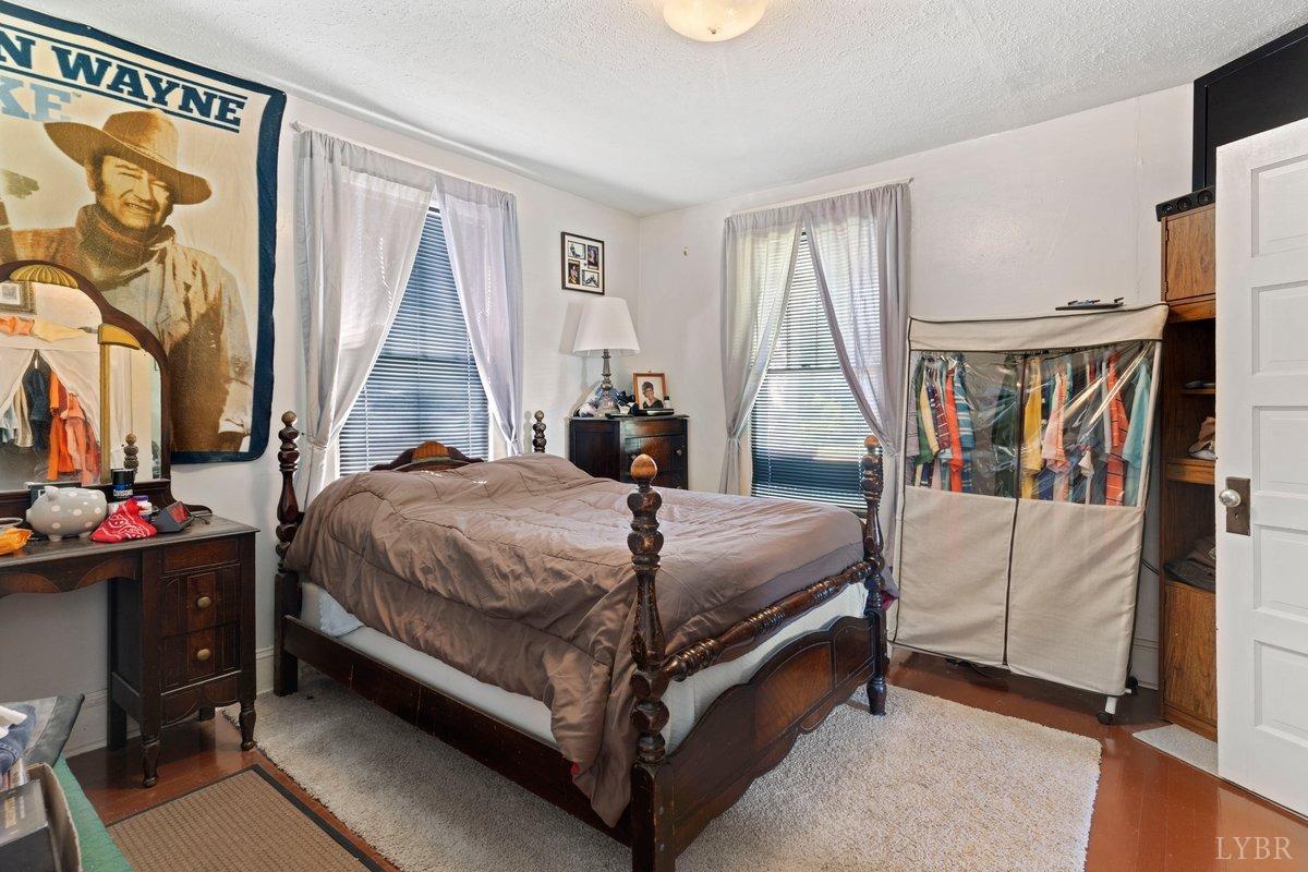 2608 Old Forest Road Lynchburg, VA 24501 - Photo 6 of 17 a bed room with a bed and a window