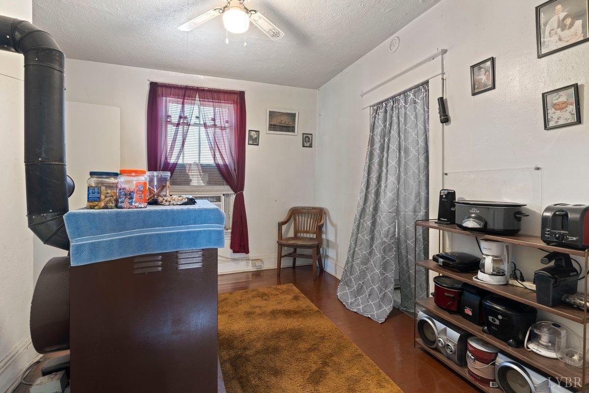 2608 Old Forest Road Lynchburg, VA 24501 - Photo 7 of 17 a living room with furniture and a wooden floor