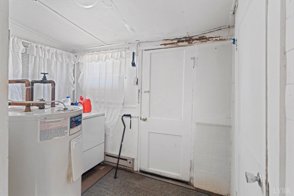 2608 Old Forest Road Lynchburg, VA 24501 - Photo 9 of 17 a bathroom with a sink vanity mirror and shower