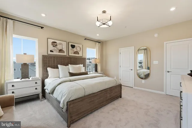 a bedroom with bed and window