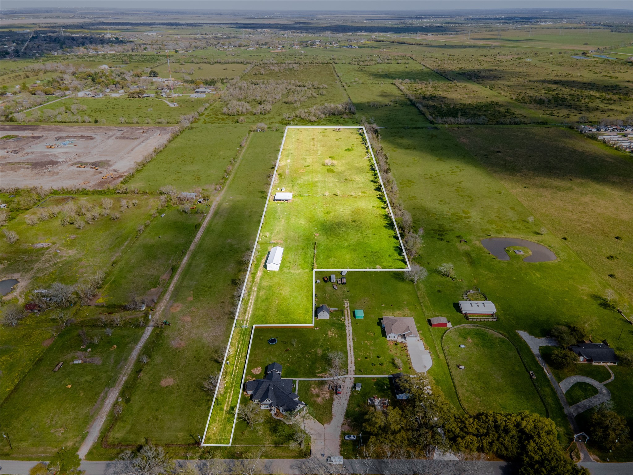2313 Shanks Road Angleton, TX 77515 - Photo 2 of 20 a view of a yard