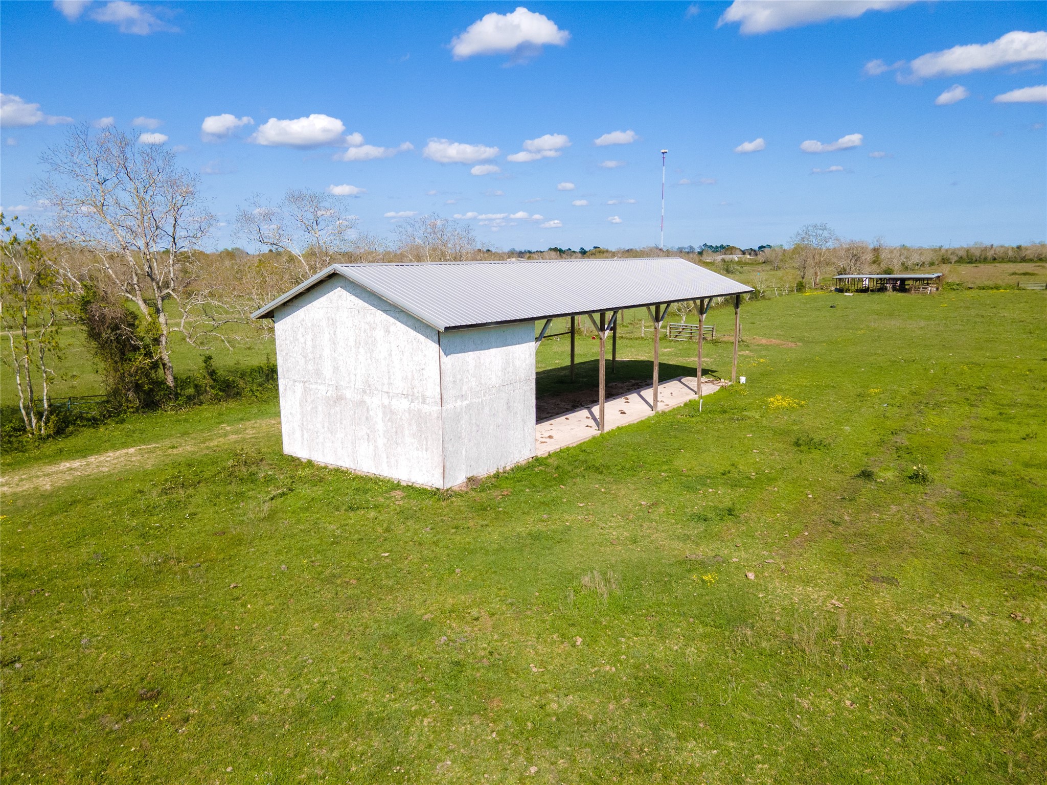 2313 Shanks Road Angleton, TX 77515 - Photo 7 of 20 a view of a house with a big yard