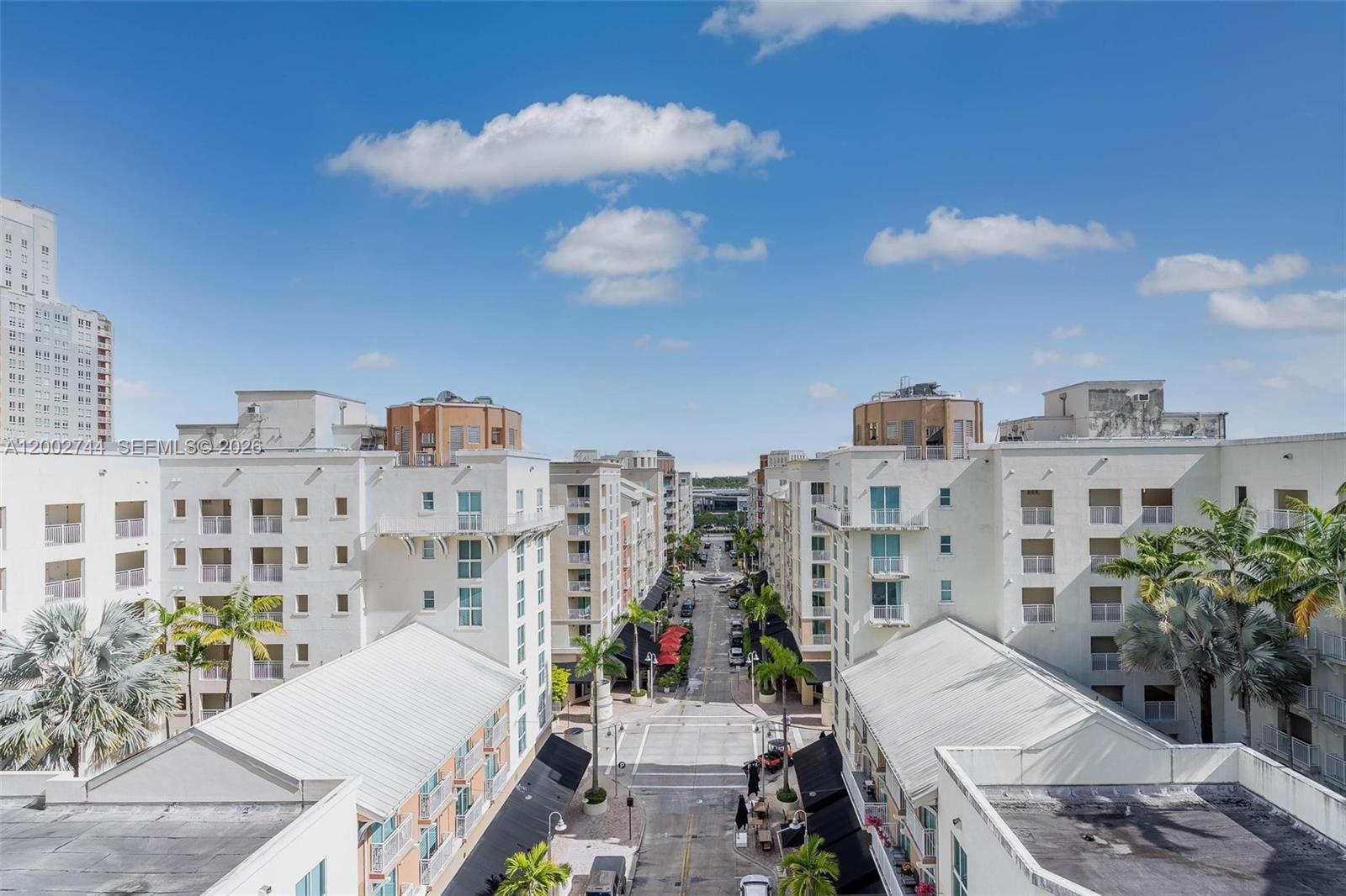 7290 Southwest 90th Street, Unit 403 Miami, FL 33156 - Photo 14 of 18 a view of a city with tall buildings