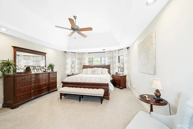 a bed room with a bed and a dresser