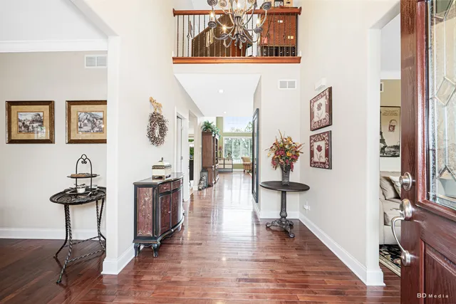 a view of a livingroom with furniture and wooden floor
