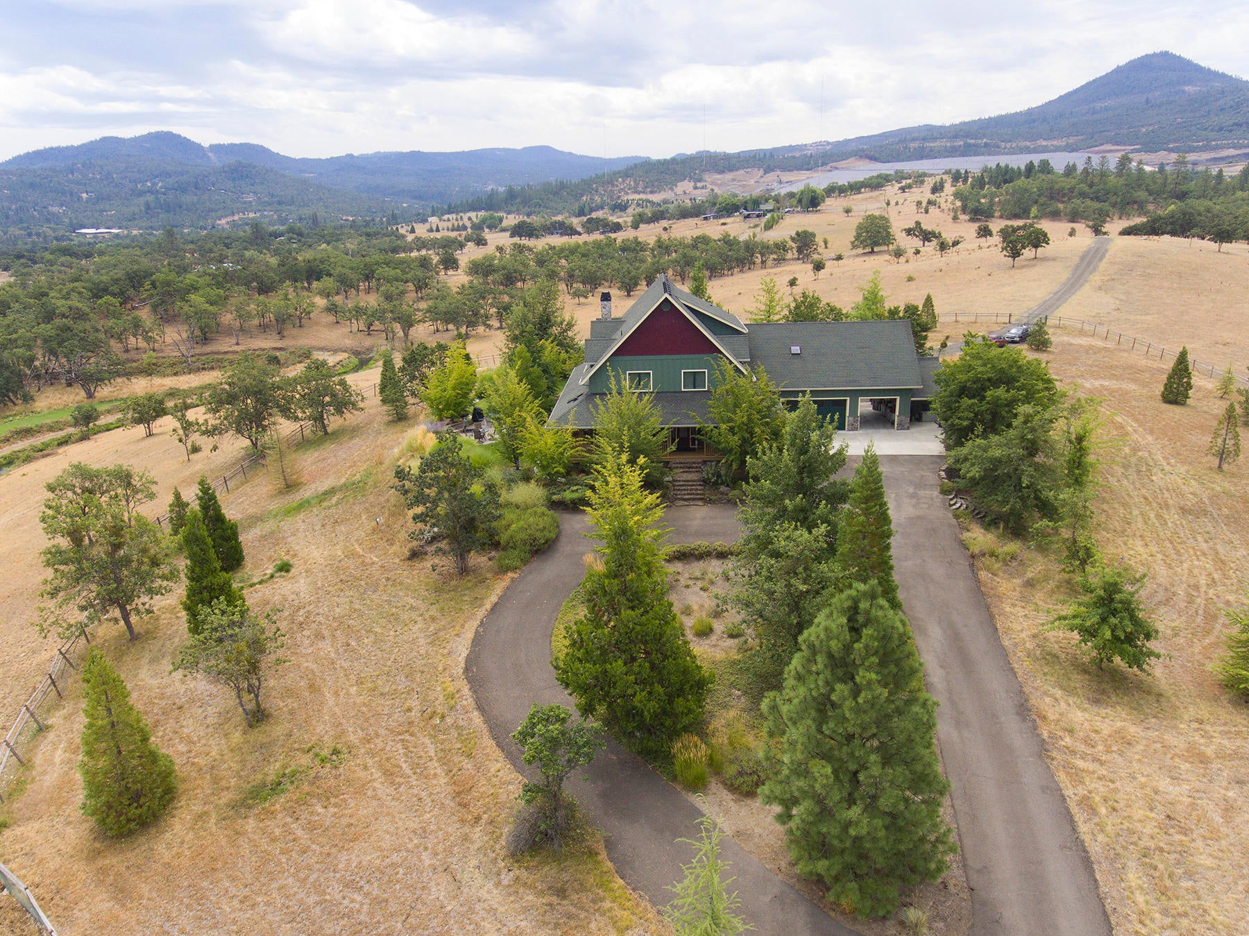 1524 Dry Creek Road Eagle Point, OR 97524 - Photo 49 of 50 Arial view of custom home with separate entrance from horse facility.