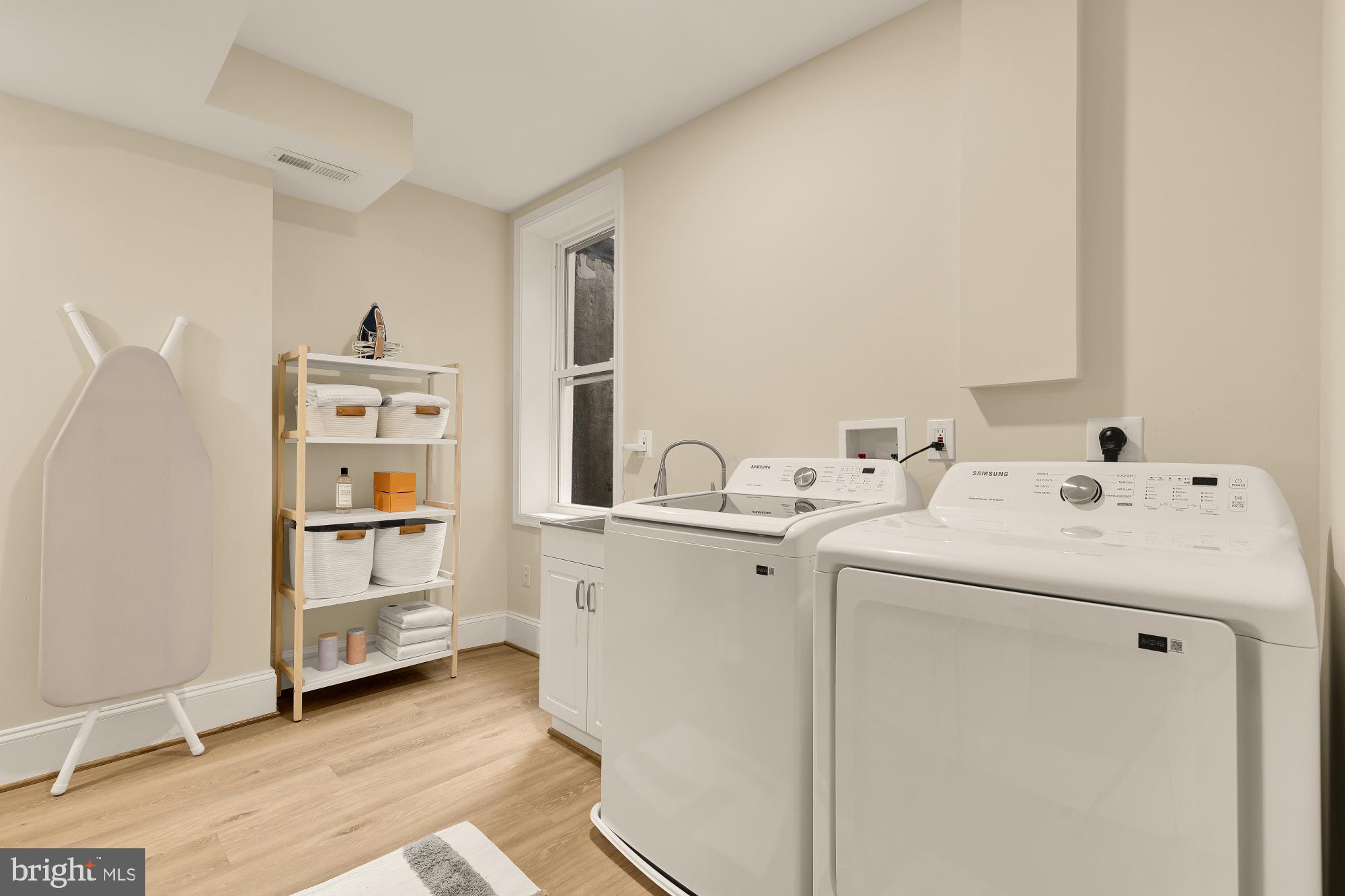 2208 East Baltimore Street Baltimore, MD 21231 - Photo 22 of 46 a utility room with dryer and washer